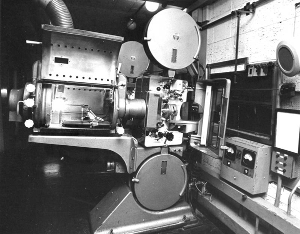 600 Projection room, showing the Phillips DP70 dual gauge 35 and 70mm projectors, with Peerless Magnarc carbon arc lamphouses of the COLUMBIA THEATRE, SHAFTESBURY AVENUE, LONDON, the name of the cinema when it opened in 1959